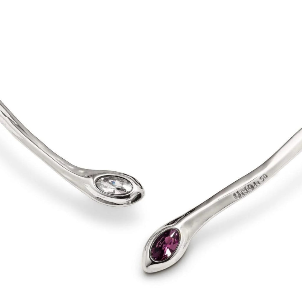 Collar Uno de 50 tipo esclava con piedra amatista y transparente