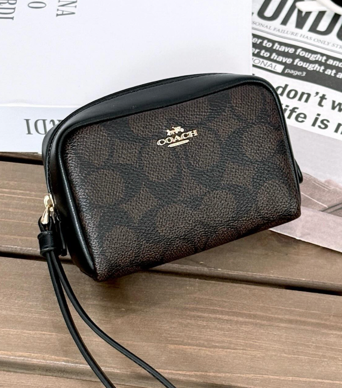 Monedero Coach monograma cafe con negro