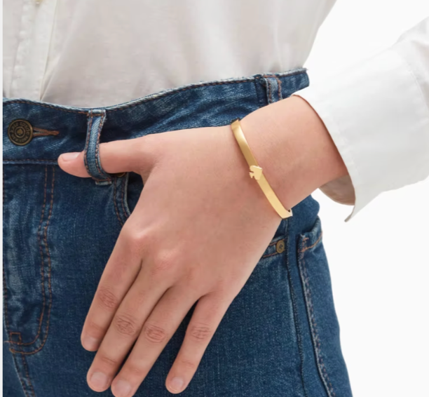 Pulsera Kate Spade esclava Everyday dorada una pica al centro