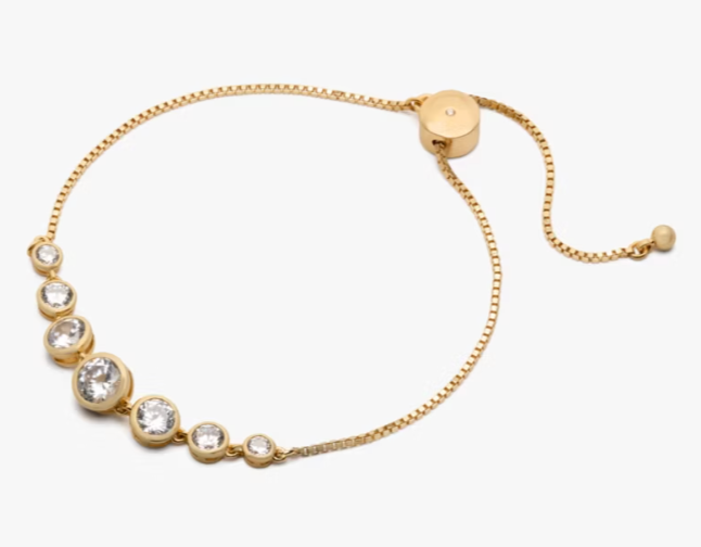 Pulsera Kate Spade cricones dorada ajustable