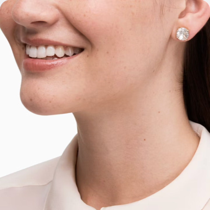 Aros Kate Spade cristal transparente con dorado