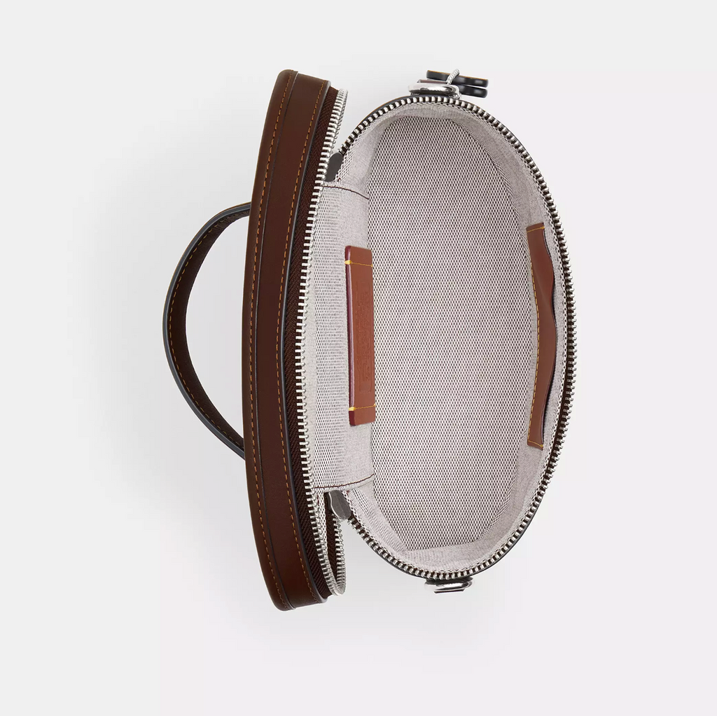 Cartera Coach Trail Bag café