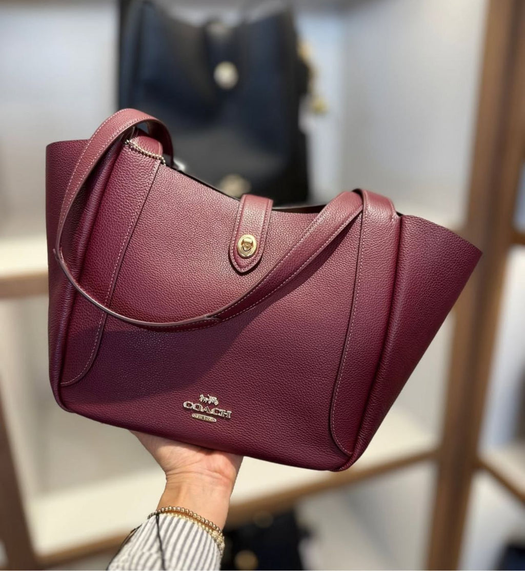 Cartera Coach Tote burdeo grande