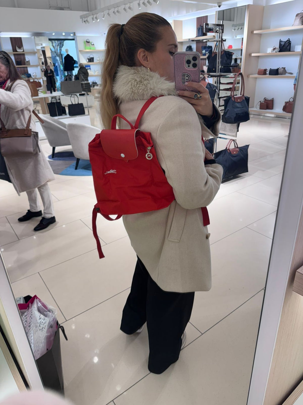 Mochila Longchamp roja completa letras blancas