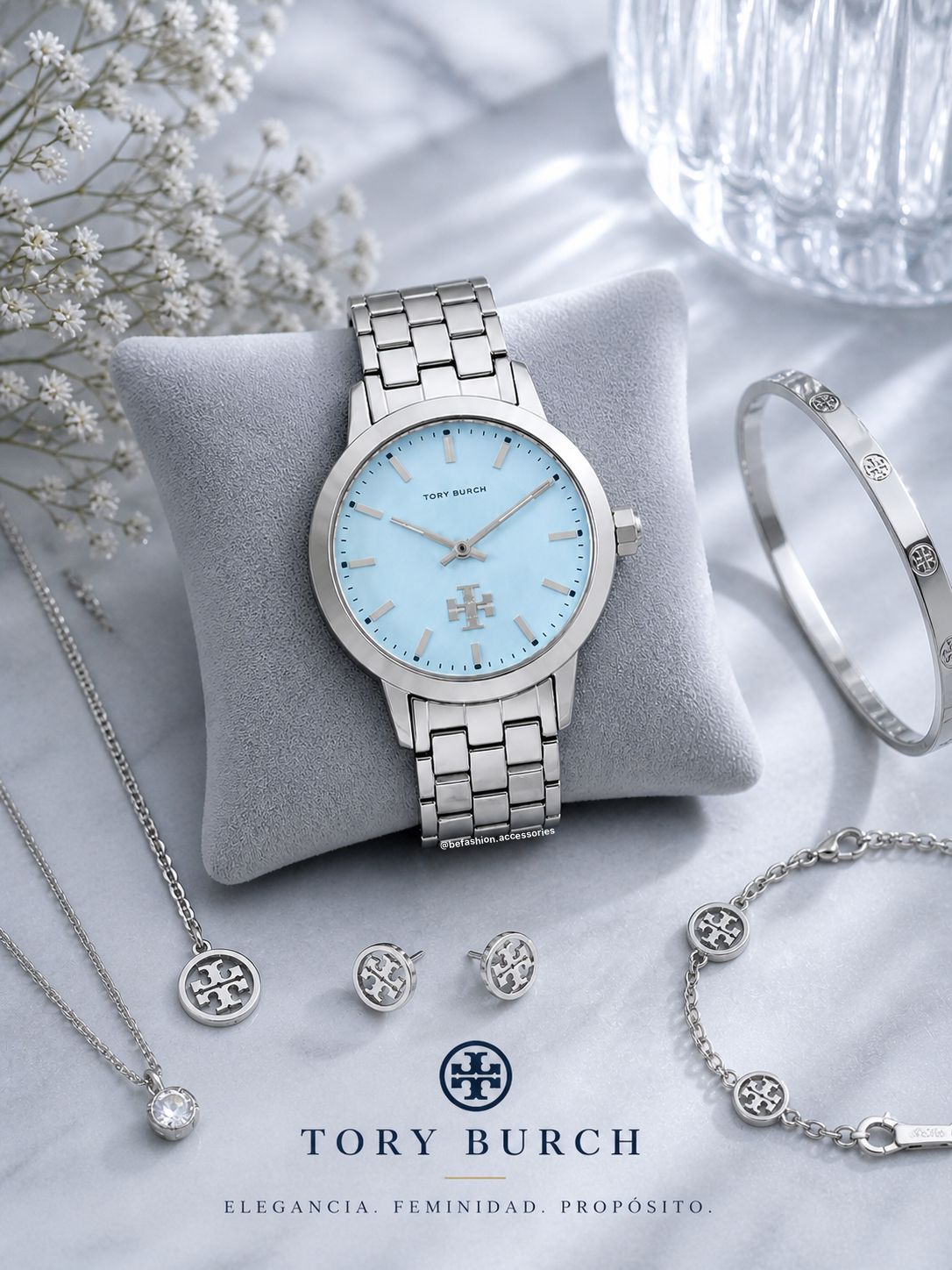 Reloj Tory Burch fondo celeste plateado