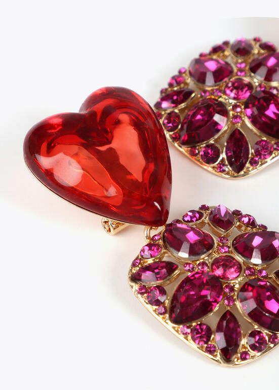 Aros Lola Casademunt Corazon rojo colgando un cuadrado morado