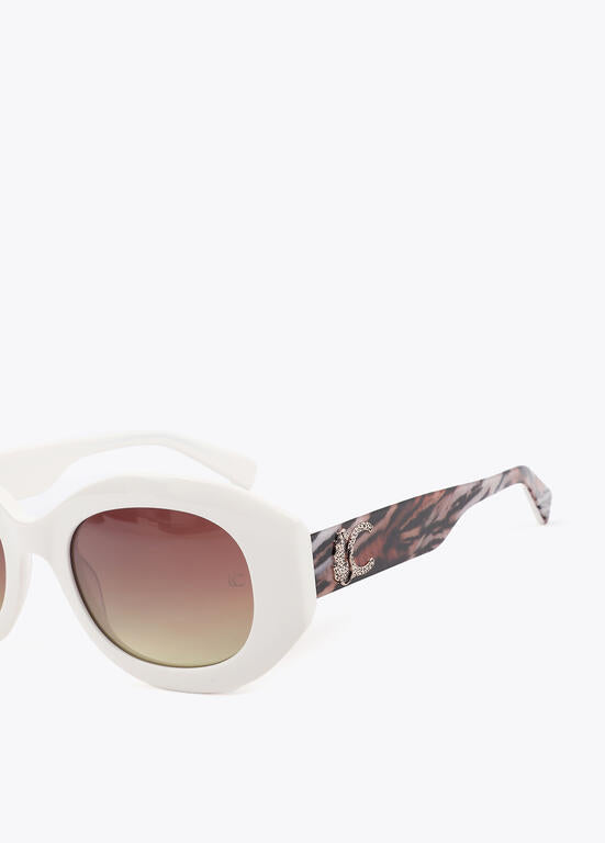 Lentes Lola Casademunt  de sol en forma redondeada crudo