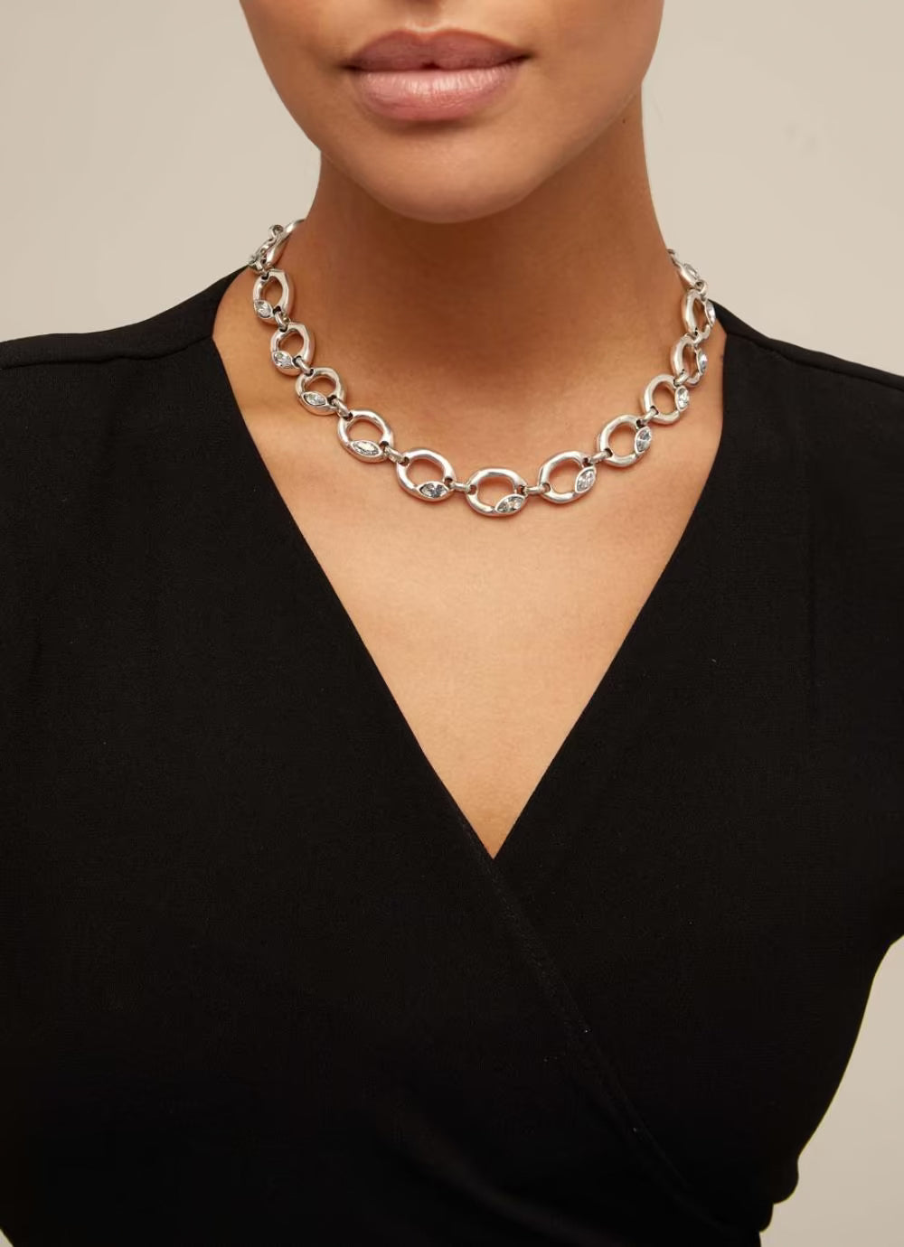 Collar Uno de 50 Details con ovalos redondos y cristal celeste