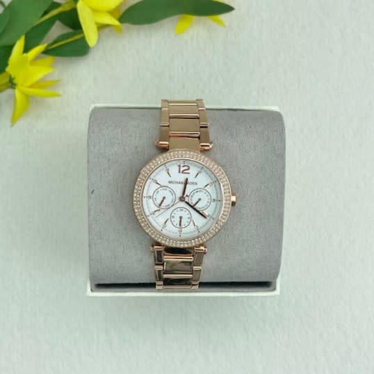 Reloj mujer Michael Kors correa metalica numeros romanos circunferencia circones rose gold